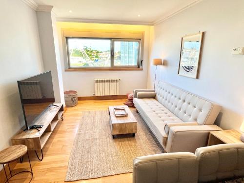 Elvina Apartment | Coruña House: Guest Rated 10/10 with Pool and Family Amenities