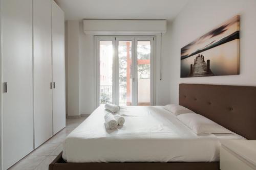 Quartiere Mazzini Apartment | Corvetto M3: Bright Apartment with Balcony & Family-Friendly