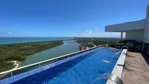 Barra de Jangada Apartment | Family-Friendly Retreat at Cosmeflats with Pool Access