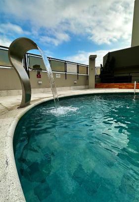 Gonzaga Hotel | Elevated Stay at Flat Cosmopolitan PRAIA with Free Parking