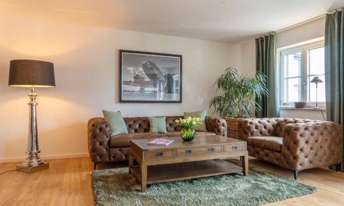 Traunstein Apartment | Cosmopolitan Suite with Balcony & Family-Friendly Amenities