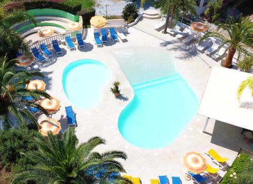 Ricadi Resort | Discover Villaggio Costa Real: Oceanfront Retreat with Pool