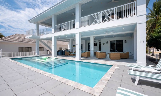 Coury House | Exclusive Home with Private Pool & Dock, Rated 10/10