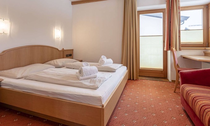 Reith bei Kitzbuehel Apartment | Cosy apartment for 5 guests with WIFI, hot tub, TV, balcony, pets allowed and parking