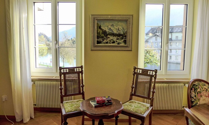 Unterseen Apartment | Cozy Apartment with WIFI, Patio & Parking for 4 Guests