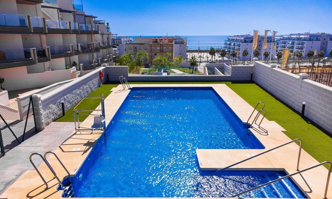 Los Llanos Apartment | Inviting Apartment for 4 with Pool and Ocean Views
