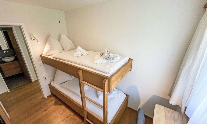 Falera Apartment | Cosy apartment for 6 people with WIFI, pool, TV, balcony and panoramic view