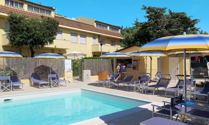 Marina di Cecina Apartment | Inviting Apartment for 8 with Pool, A/C, and Pet-Friendly Perks