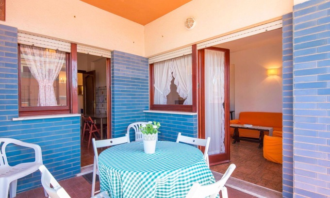 Torvaianica Apartment | Cozy Apartment for 4 with Ocean View, Terrace & Parking