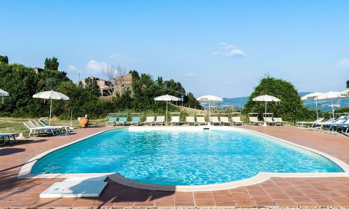 Castelnuovo di Val di Cecina Villa | Inviting Villa Apartment for 4 with Pool and Pet-Friendly Amenities