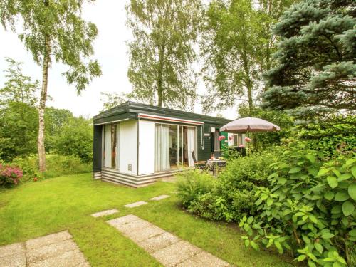 Ootmarsum Ski Chalet | Cozy Chalet with Gas Fireplace in Twente Holiday Park