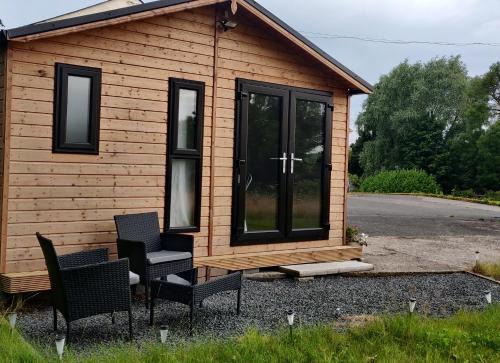 Comber House | Inviting Log Cabin with Scenic Views of Scrabo Tower