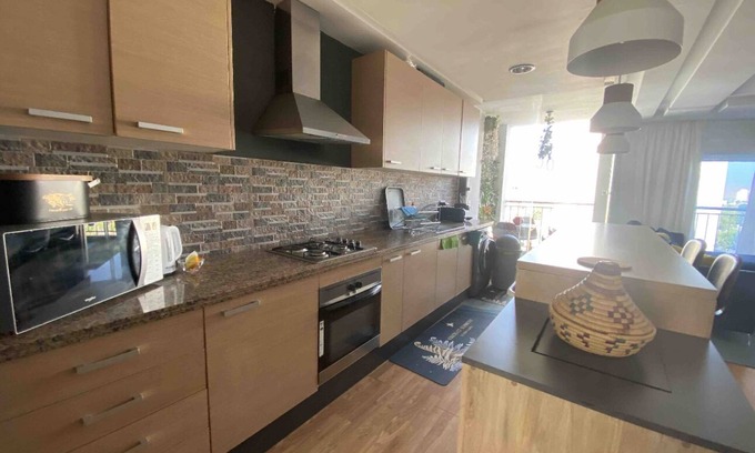 El Ensanche Apartment | Modern Flat in City Center, Steps from Beach & Malabata