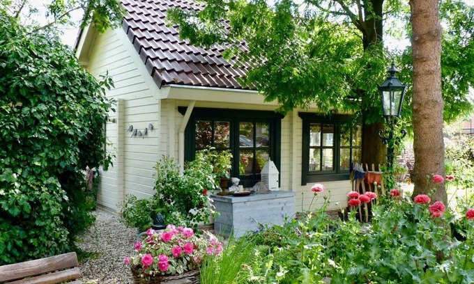Heinenoord House | Inviting Retreat with Fireplace, Garden & Eco-Friendly Bikers