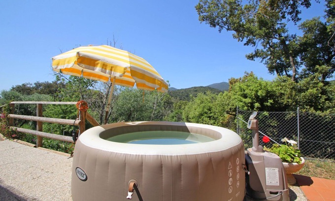 Castiglione della Pescaia House | Nature-Infused Cottage with Oceanfront Views & Spa