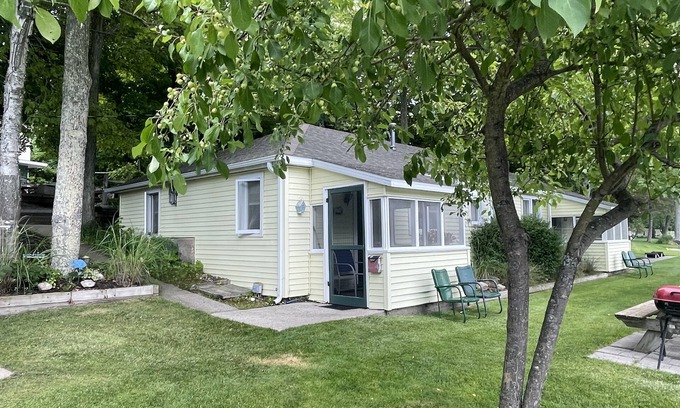 Ludington Cottage | Cozy Cottage 3: Lake View & Steps from Hamlin Dock