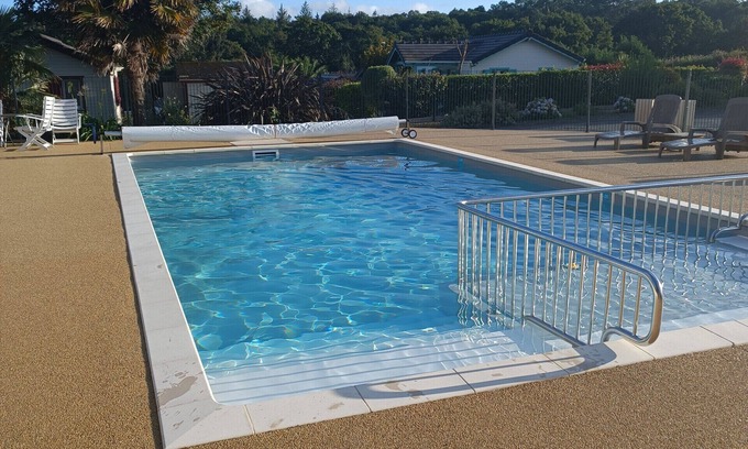 Pont-l'Abbe Ski Chalet | Discover Serenity: Ocean-Forest Retreat with Pool Access