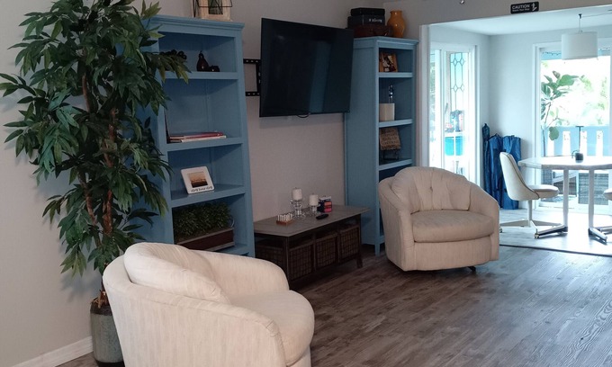 Ridge Wood Heights Cottage | Cozy Cottage Steps from the Beach with Spa and Hot Tub