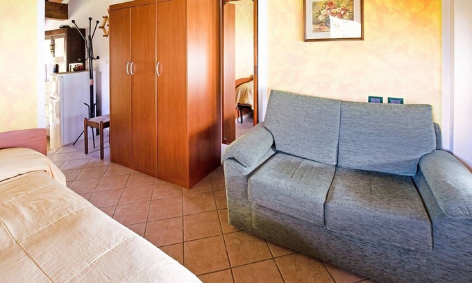 Idro Cottage | Belvilla by OYO Fienile Regoli Due: Pet-Friendly Retreat