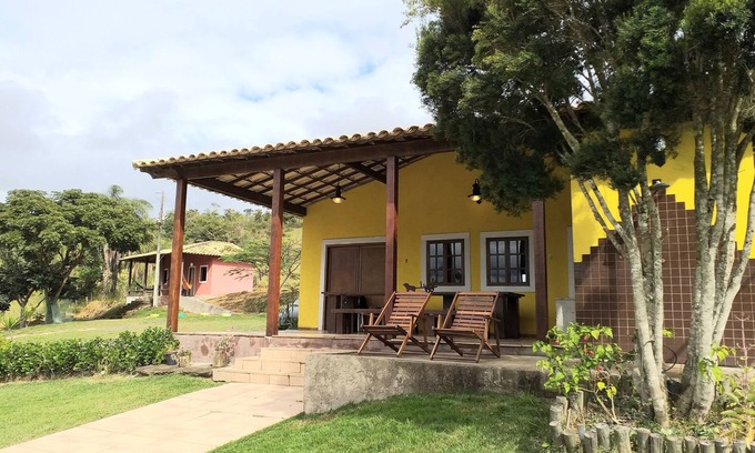 Itabira Cottage | Tranquil Cottage: Perfect Retreat with Ocean View & Pool