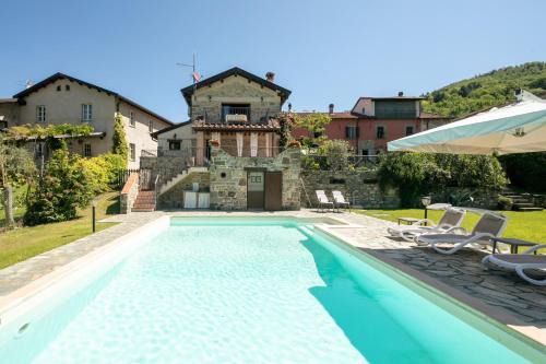 Fivizzano Villa | Idyllic Country House with Pool and Ocean Views in Fivizzano