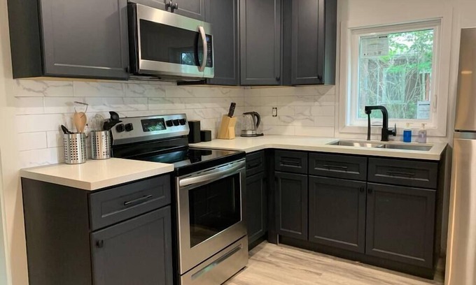 Wellington Apartment | Delightful County Cove - Wellington Suite with Essential Amenities