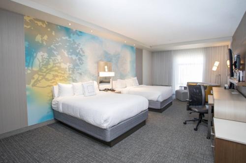 Albion Hotel | Inviting Courtyard by Marriott Albion with Oceanfront Views
