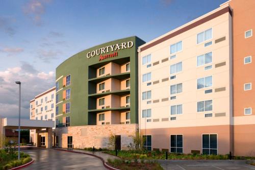 The Colony Hotel | Relaxing Retreat at Courtyard by Marriott Dallas Plano