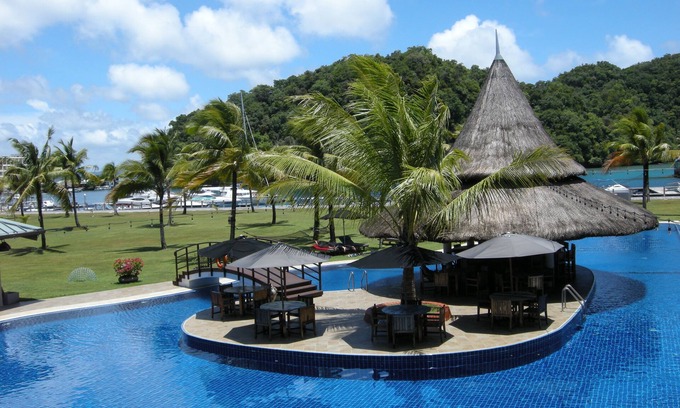 Koror Hotel | Relax at Cove Resort Palau: Poolside Paradise Awaits