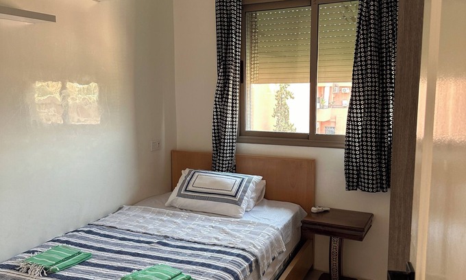 Camp El Ghoul Apartment | Cozy 2-bedroom apartment in awesome Marrakech with WiFi, AC