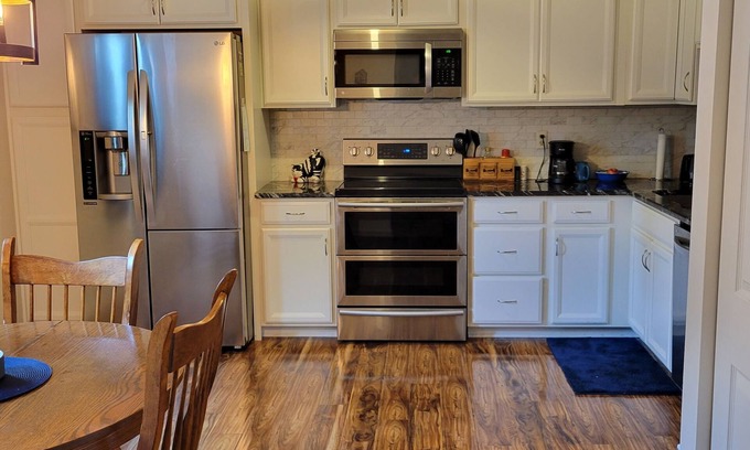 Buechel Condo | Inviting 2-Story Townhouse with Playroom & Putting Green