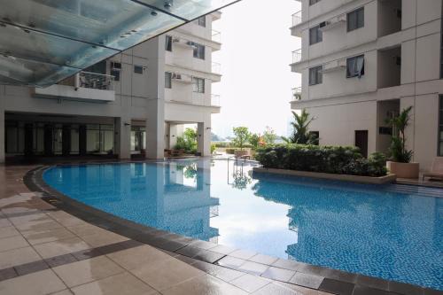 New Manila Apartment | Cozy 2BR Condo with Parking