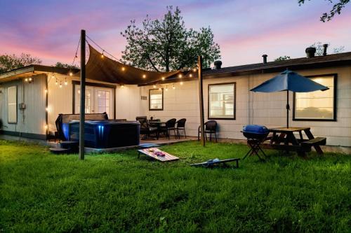 Southside House | Inviting 3-Bedroom Retreat with Hot Tub Near Lackland