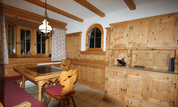 Klosters Dorf Apartment | Charming Maisonette with Pool and Scenic Mountain Views