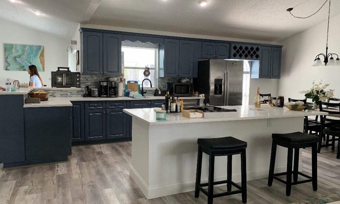 Poinciana House | Charming 4-Bedroom Retreat with Private Pool Near Disney