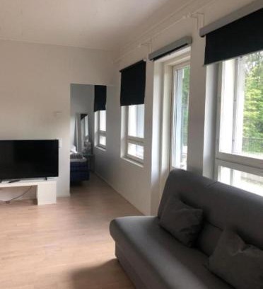 Espoo Apartment | Serene Duplex Retreat with Terrace & Complimentary Breakfast