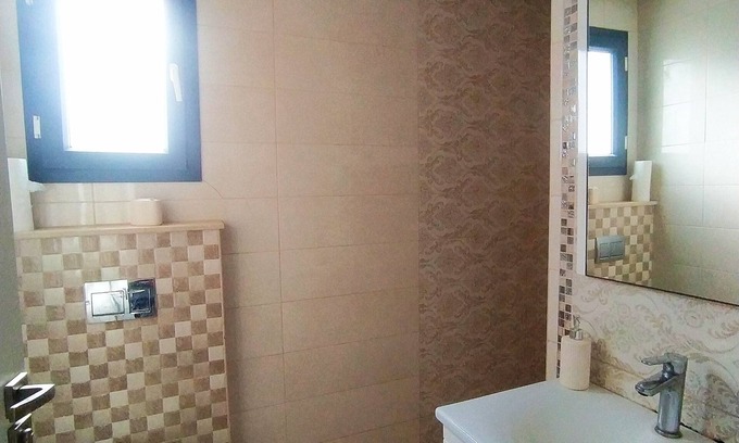 Kheredine Apartment | Beachside Retreat: Pet-Friendly Apartment Steps from Sand
