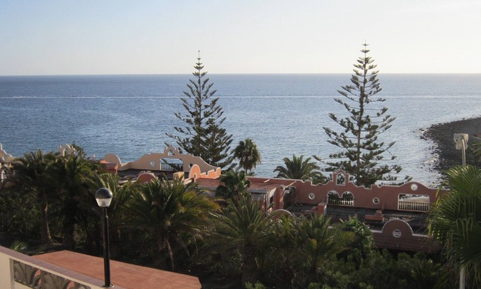 Mogan Apartment | Seaside Haven: Cozy Apartment with Pool at Jardin Paraiso