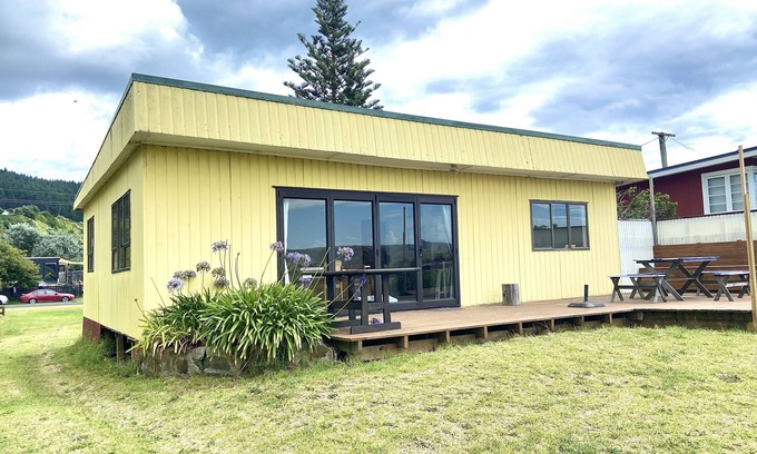 Te Akau House | Idyllic Riverfront Retreat with Family-Friendly Amenities