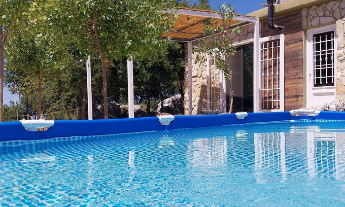 Kfardebian House | Cozy bungalow integrated in the rocks between the oaks in charming Aannaya