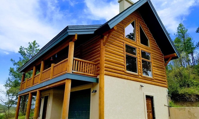 Pagosa Springs Cabin | Charming Cabin Retreat with Pool & Spa at Enchanted Wood