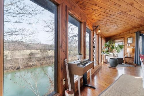 Lobelville House | Inviting Cabin Retreat on Buffalo River with Expansive Patio