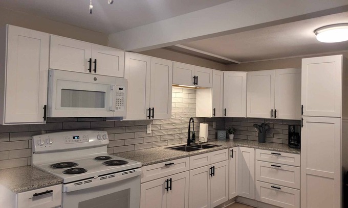 Lindbergh Lawns House | Conveniently Located Cape Near Fairgrounds and Downtown