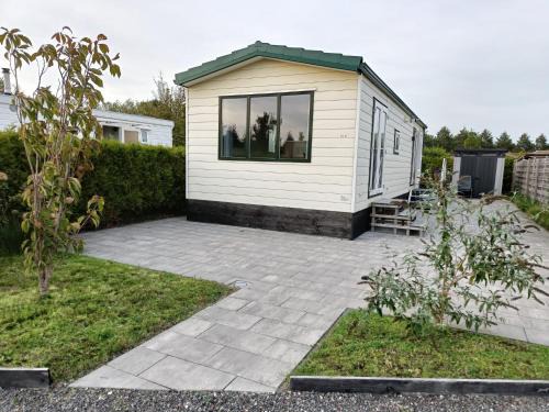 Berkhout Ski Chalet | Charming Chalet Retreat near Amsterdam at Camping Venhop