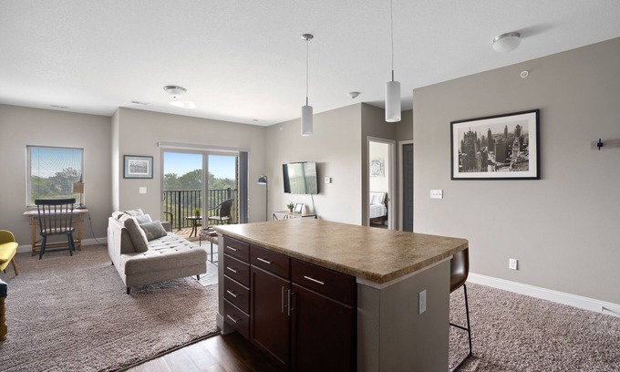 West Des Moines Apartment | Inviting Balcony Retreat with Pool and Pet-Friendly Perks
