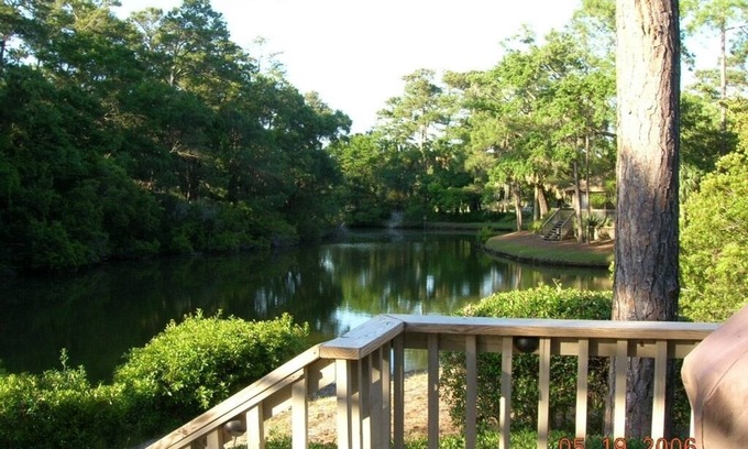 West Beach Cottage | Charming Cottage with Lagoon View, Steps from Beach & Pool