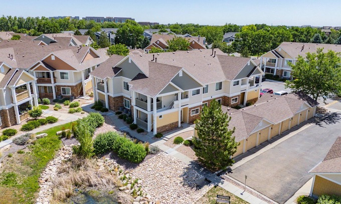 Centerra Condo | Charming Condo Retreat with Lake Views and Hot Tub