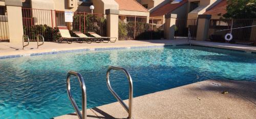 Mesa House | Inviting Condo Near MCC with Pool & BBQ Area Awaiting You