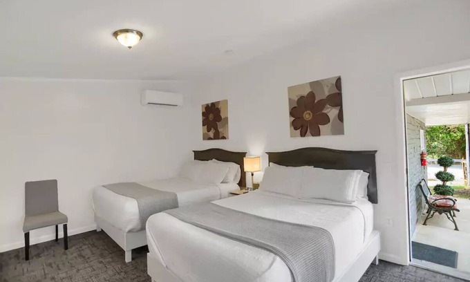 Halifax Apartment | Inviting Double Queen Room 104 at Halifax Inn - Guest Rated 10/10