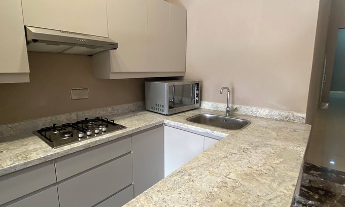 Hada'iq al-Qubbah Apartment | Cozy double Room with private bathroom in El Banfseg, Cairo with Free WiFi
